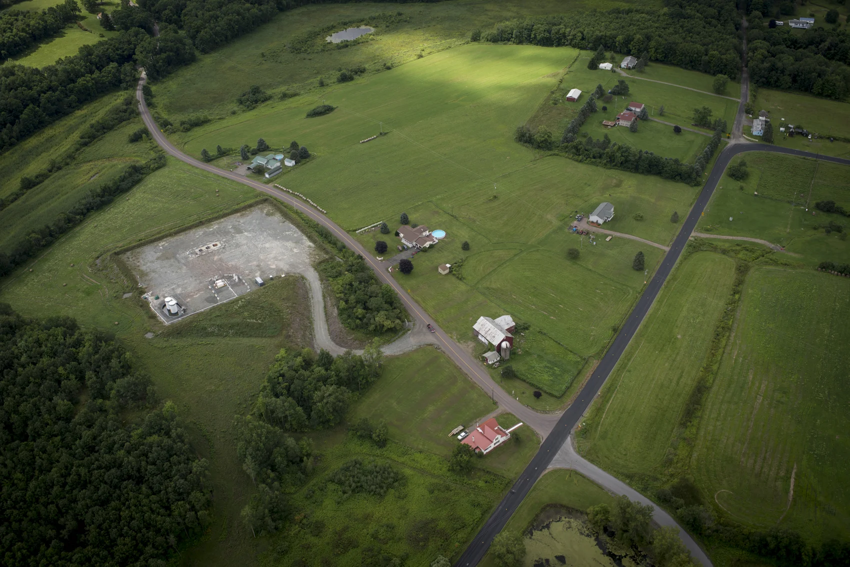 Drilling sites in various stages of the gas extraction process dot the landscape. This aerial photo was taken in Bradford County, about a mile from my parents' home.
