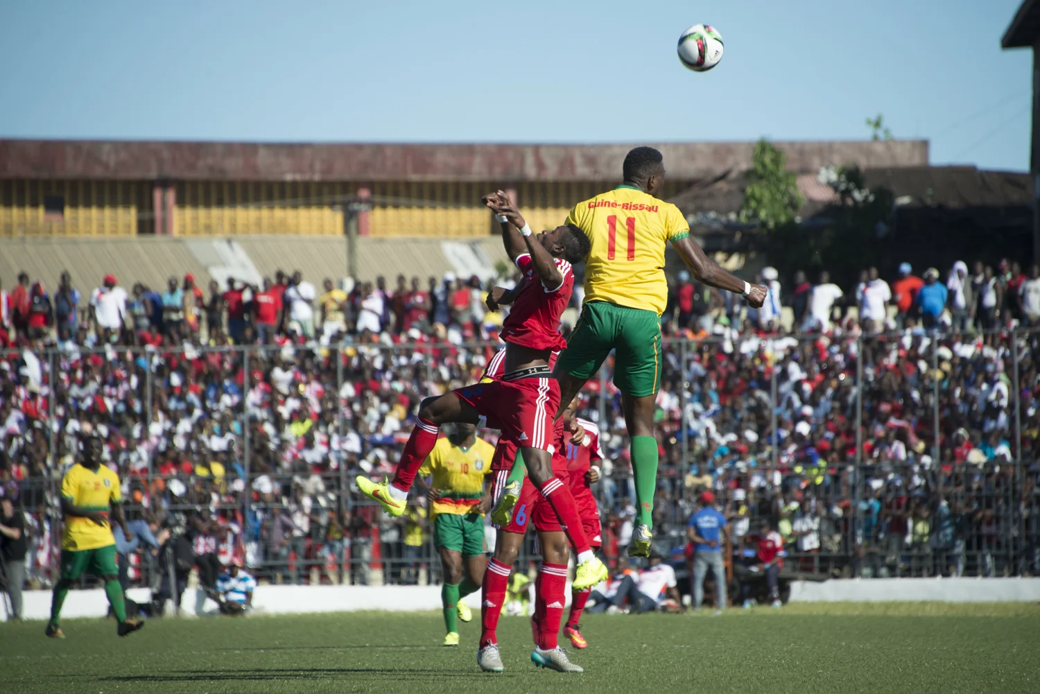 This story was originally published by The Player's Tribune on Oct. 29, 2015. When the Ebola outbreak occurred in Liberia in 2014, one of the biggest cultural impacts was the government’s decision last June to ban all soccer play in an effort to reduce to spread of the virus through physical contact. With the number of cases declining, the ban on soccer was lifted in January. Nearly 5,000 people died before the country was declared Ebola-free this past May. This summer, a three-day tournament took place in Logan Town, a community north of Monrovia, that consisted of both men’s soccer matches and women’s kick ball games. The tournament was played on a large, muddy patch of oddly-shaped common area, which included the only road into that part of Logan Town. As such, the goals (made out of netting and tree branches) were not placed directly opposite each other, and a large delivery truck drove across the field repeatedly interrupting play. A party-like atmosphere surrounded the event, with loud music playing and many people drinking cheap booze out of small plastic bottles. Younger kids watched the matches eagerly, jockeying for every opportunity to run after an out-of-bounds ball and throw it back into play. When the last soccer match came down to a penalty shootout, a thick mob of people formed around the goal. Team bragging rights and a small cash prize were on the line. The kick was good and celebrations could finally begin. On Oct. 8, 2015 Liberia’s national team, the Lone Stars, played Guinea-Bissau in a FIFA World Cup Qualifying match, which was held on a regulation field at Antoinette Tubman Stadium in central Monrovia. Following the Ebola outbreak and the ban of soccer in the country in 2014, the stadium was converted for use as an Ebola Treatment Unit. Now back to it’s originally intended use, rowdy, celebrating Liberians packed the stadium for the match, which ended in a 1-1 tie. A week later, Liberia pulled off an unexpected win against Guinea-Bissau. Liberia is now scheduled to play Ivory Coast in a second-round qualifying match on Nov. 11. “If Liberia loses, there will be a riot,” one fan said. “If we win, there will still probably be a riot.”