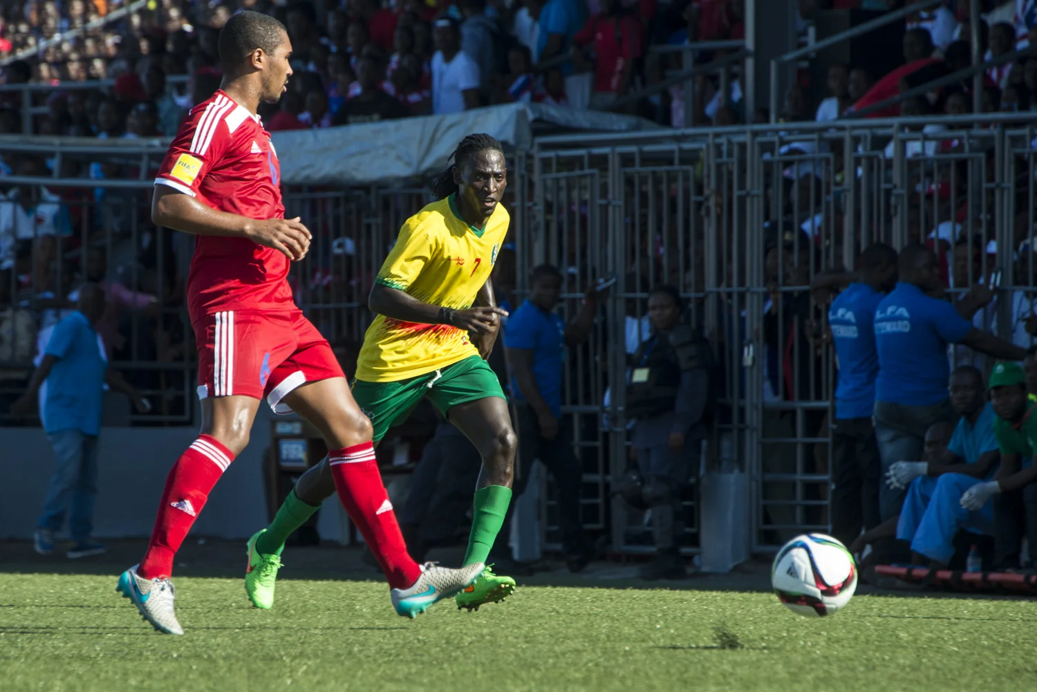 This story was originally published by The Player's Tribune on Oct. 29, 2015. When the Ebola outbreak occurred in Liberia in 2014, one of the biggest cultural impacts was the government’s decision last June to ban all soccer play in an effort to reduce to spread of the virus through physical contact. With the number of cases declining, the ban on soccer was lifted in January. Nearly 5,000 people died before the country was declared Ebola-free this past May. This summer, a three-day tournament took place in Logan Town, a community north of Monrovia, that consisted of both men’s soccer matches and women’s kick ball games. The tournament was played on a large, muddy patch of oddly-shaped common area, which included the only road into that part of Logan Town. As such, the goals (made out of netting and tree branches) were not placed directly opposite each other, and a large delivery truck drove across the field repeatedly interrupting play. A party-like atmosphere surrounded the event, with loud music playing and many people drinking cheap booze out of small plastic bottles. Younger kids watched the matches eagerly, jockeying for every opportunity to run after an out-of-bounds ball and throw it back into play. When the last soccer match came down to a penalty shootout, a thick mob of people formed around the goal. Team bragging rights and a small cash prize were on the line. The kick was good and celebrations could finally begin. On Oct. 8, 2015 Liberia’s national team, the Lone Stars, played Guinea-Bissau in a FIFA World Cup Qualifying match, which was held on a regulation field at Antoinette Tubman Stadium in central Monrovia. Following the Ebola outbreak and the ban of soccer in the country in 2014, the stadium was converted for use as an Ebola Treatment Unit. Now back to it’s originally intended use, rowdy, celebrating Liberians packed the stadium for the match, which ended in a 1-1 tie. A week later, Liberia pulled off an unexpected win against Guinea-Bissau. Liberia is now scheduled to play Ivory Coast in a second-round qualifying match on Nov. 11. “If Liberia loses, there will be a riot,” one fan said. “If we win, there will still probably be a riot.”
