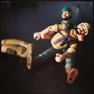 "Clutch! Talk to me buddy! No, god no. Hold on, Clutch. Why?!? " It only takes a second to have an accident. Don't let this happen to your action figures. Treat them well. --PETAF (People for the Ethical Treatment of Action Figures)