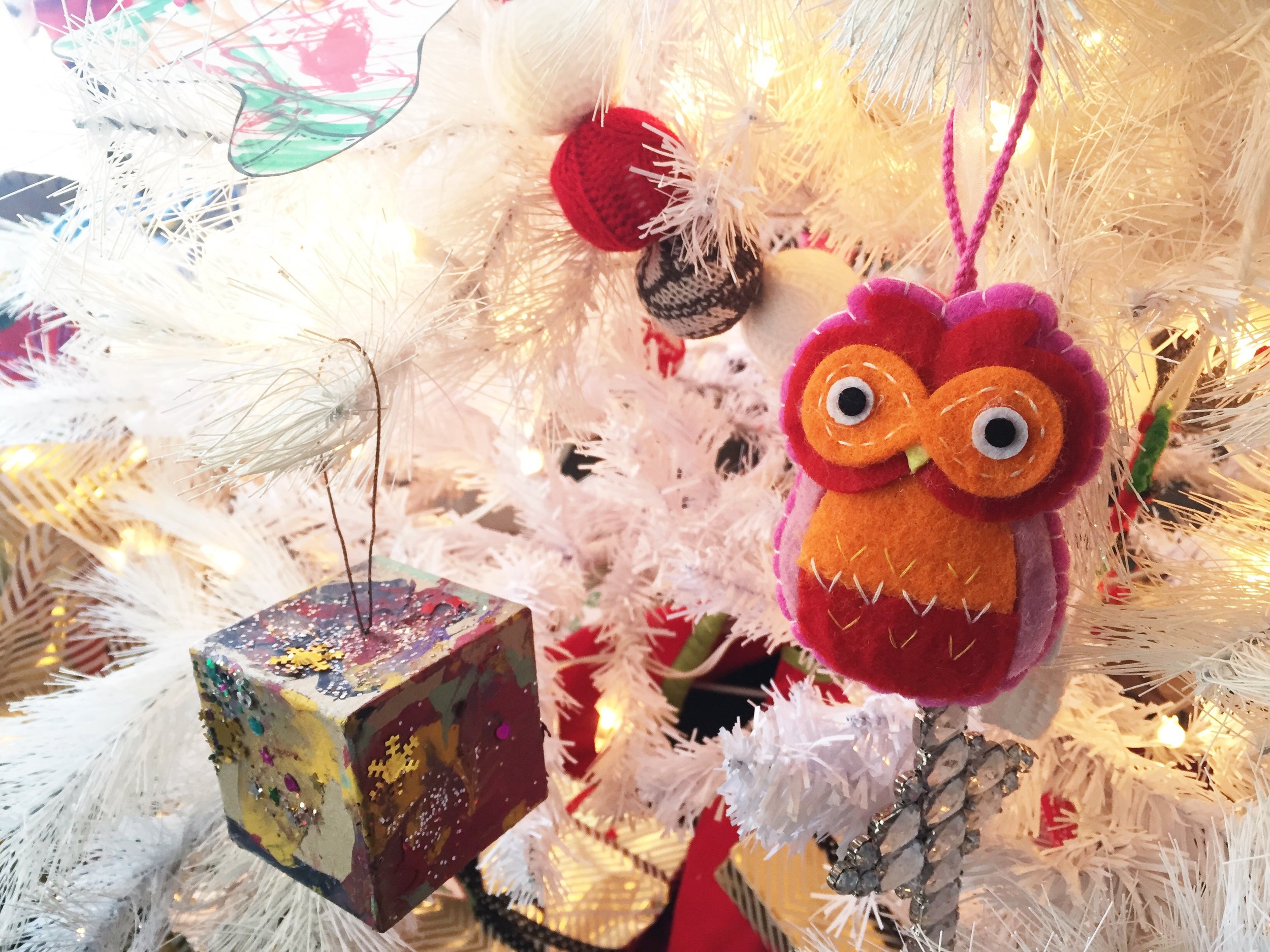This owl is our china baby's first ornament on our tree. I pick one out for the kids each year. no- we don't have a name for her yet, so we just call her "our china baby" for now! :)