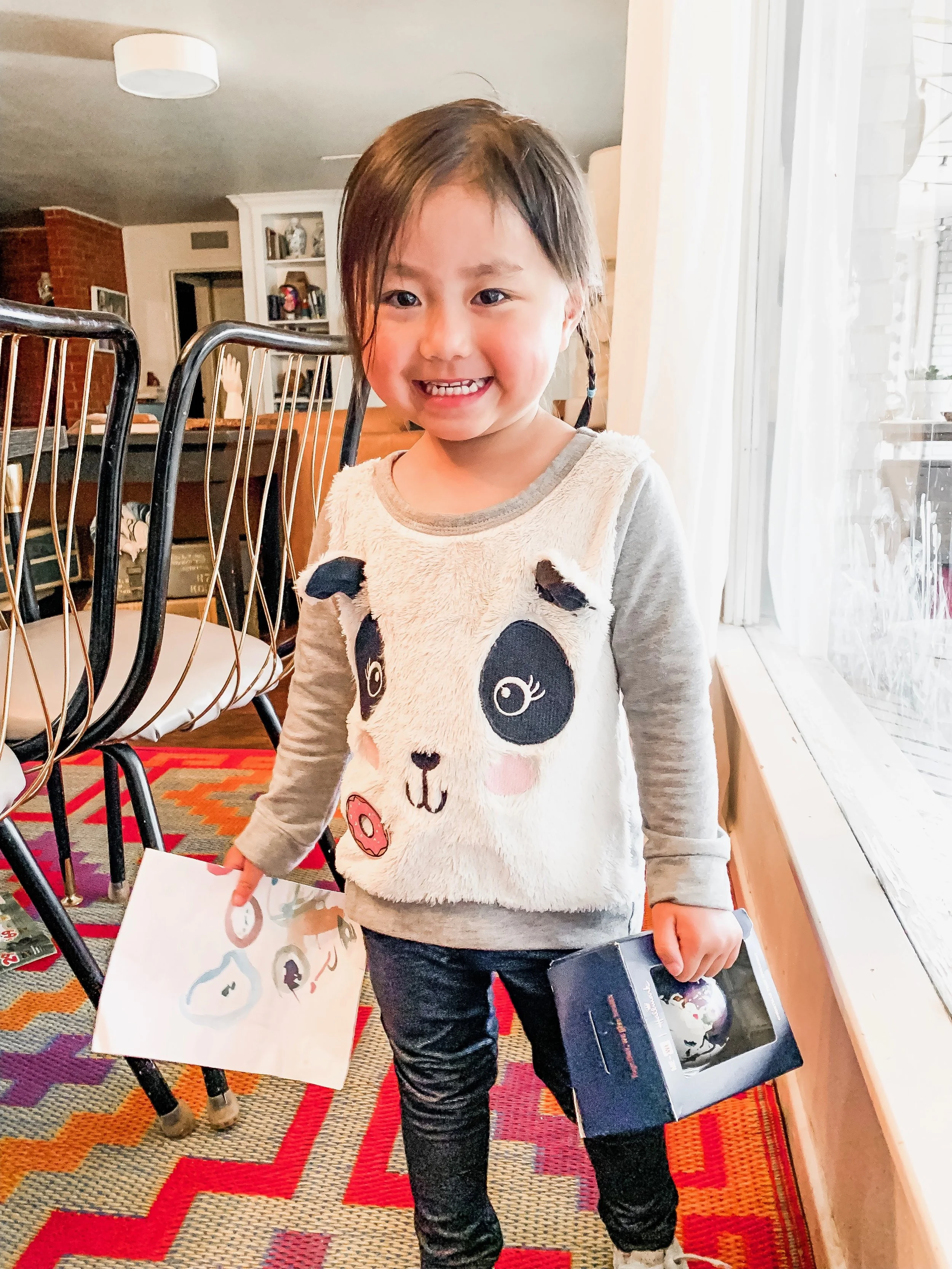 I feel like she looks about 14 here. 😭Lucy is holding a note and an ornament from her friend who was adopted the same day and was in the same orphanage. I love that they/we have that special connection!