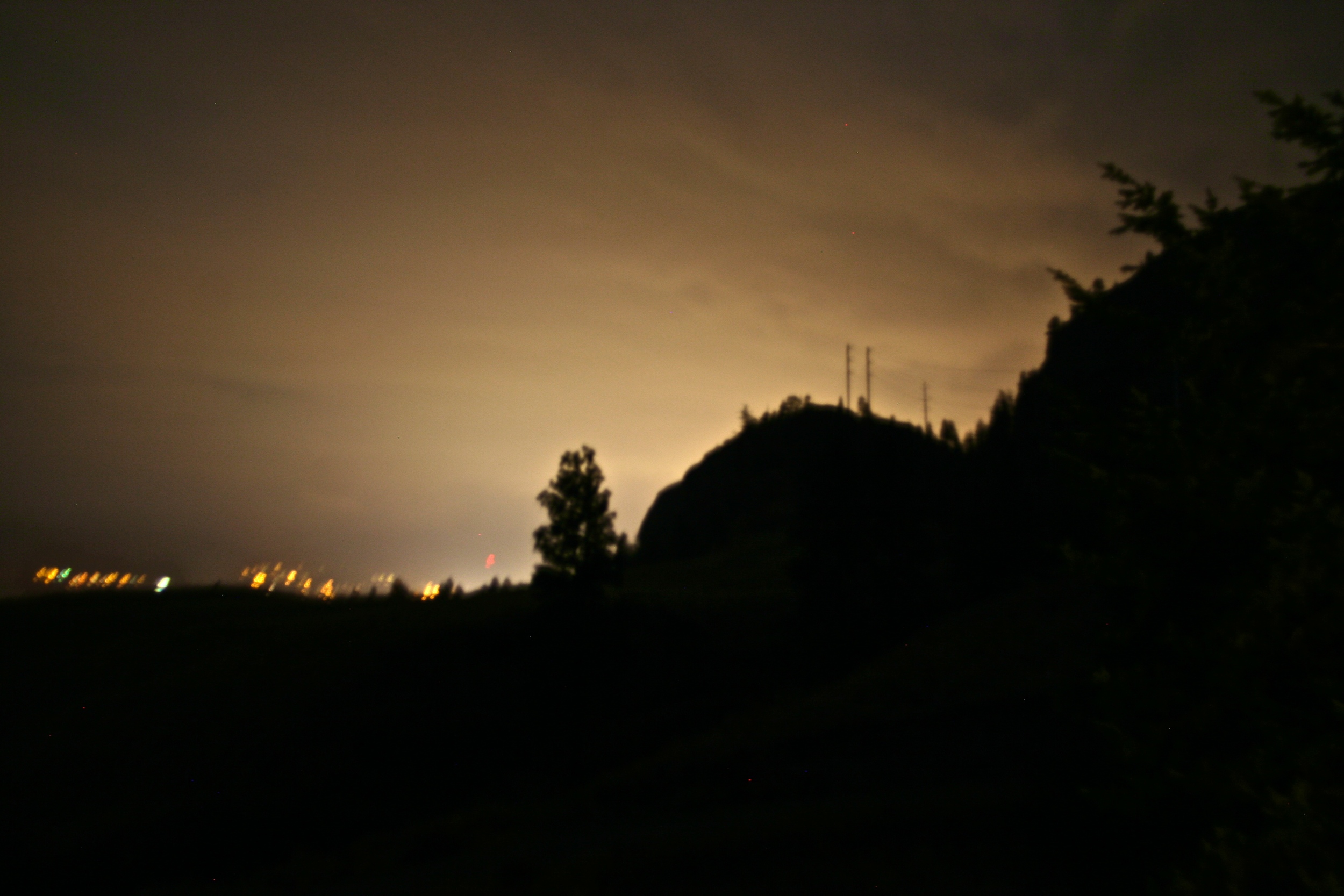  The evening lights of Penticton shining over the Bluffs at the winery. 