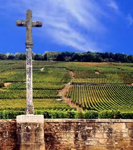 A cross outside the vineyards of Burgundy's Vosne - Romanée.