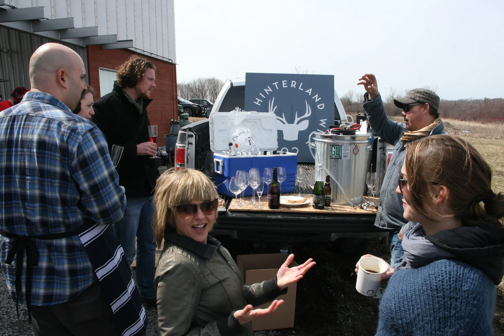 Kobe Desramaults from In de Wulf having some bubbles with Vicki and Jonas from Hinterland Wine Co. and a pickup full of their Prince Edward County sparkling wine. Whitecap on tap in a garbage can full of ice?? #NoBigDeal
