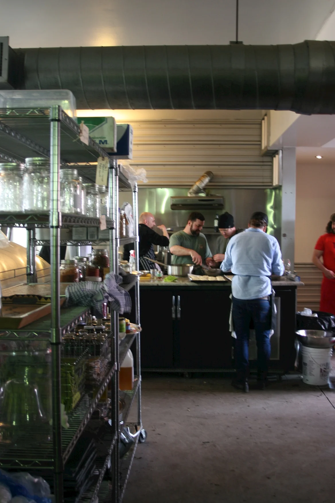 Chefs cheffing away in the winery's fully equipped kitchen.
