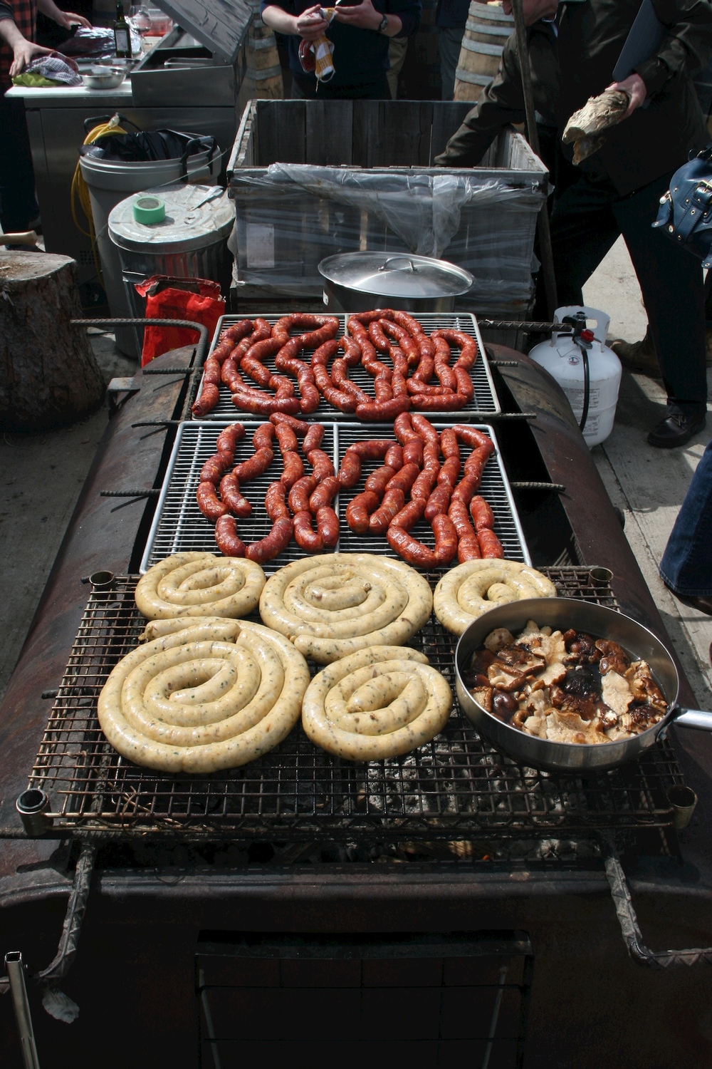  Johannes' homemade sausages on the grill.​ 