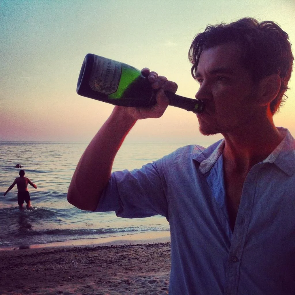 And of course, when at Norm's...Grand Cru Blanc de Blanc at the beach...Jamie jumps into Lake Ontario in the background.