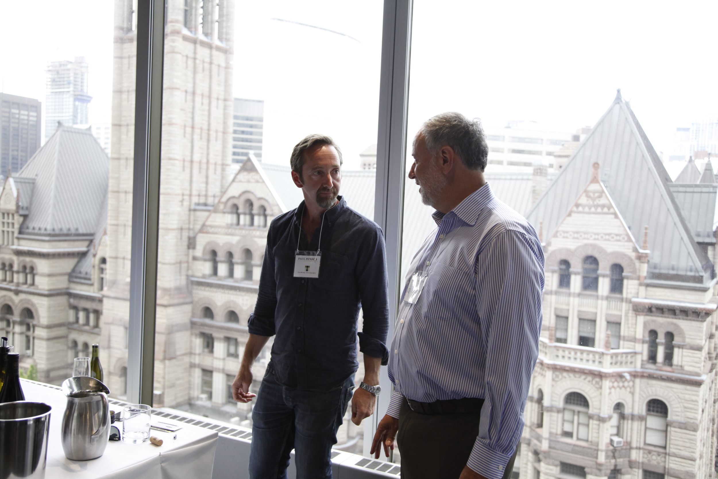  Tawse winemaker Paul Pender chatting Niagara Pinot Noir with Domaine Queylus proprietor Gilles Chevalier.  