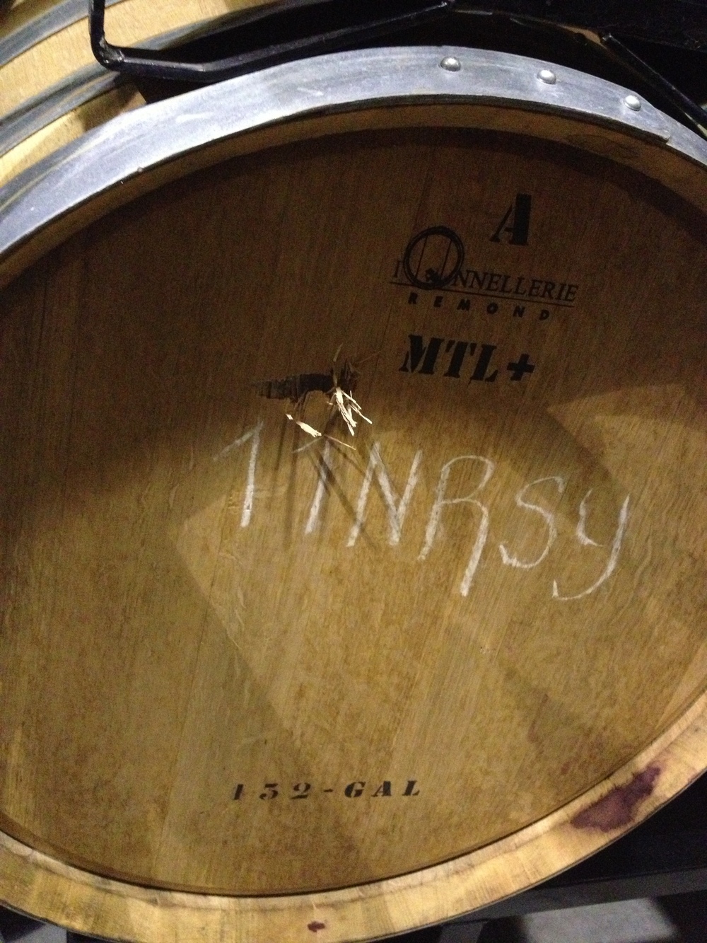  This barrel suffered a drive-by shooting outside their Walla Walla warehouse recently. Luckily the .45 Calibre bullet that came through the garage door didn't pierce the barrel, but ricocheted into the ceiling. That's bad-ass Syrah. **Also, no death