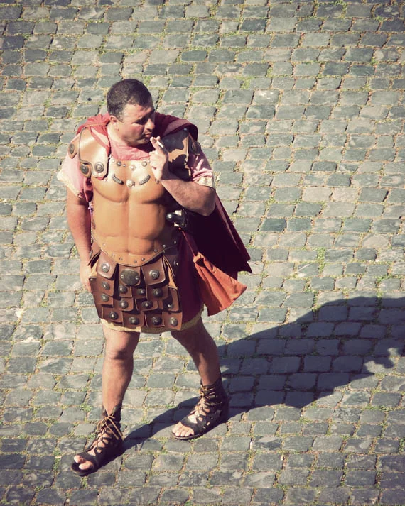A tourist-loving Roman "gladiator" takes a much needed break