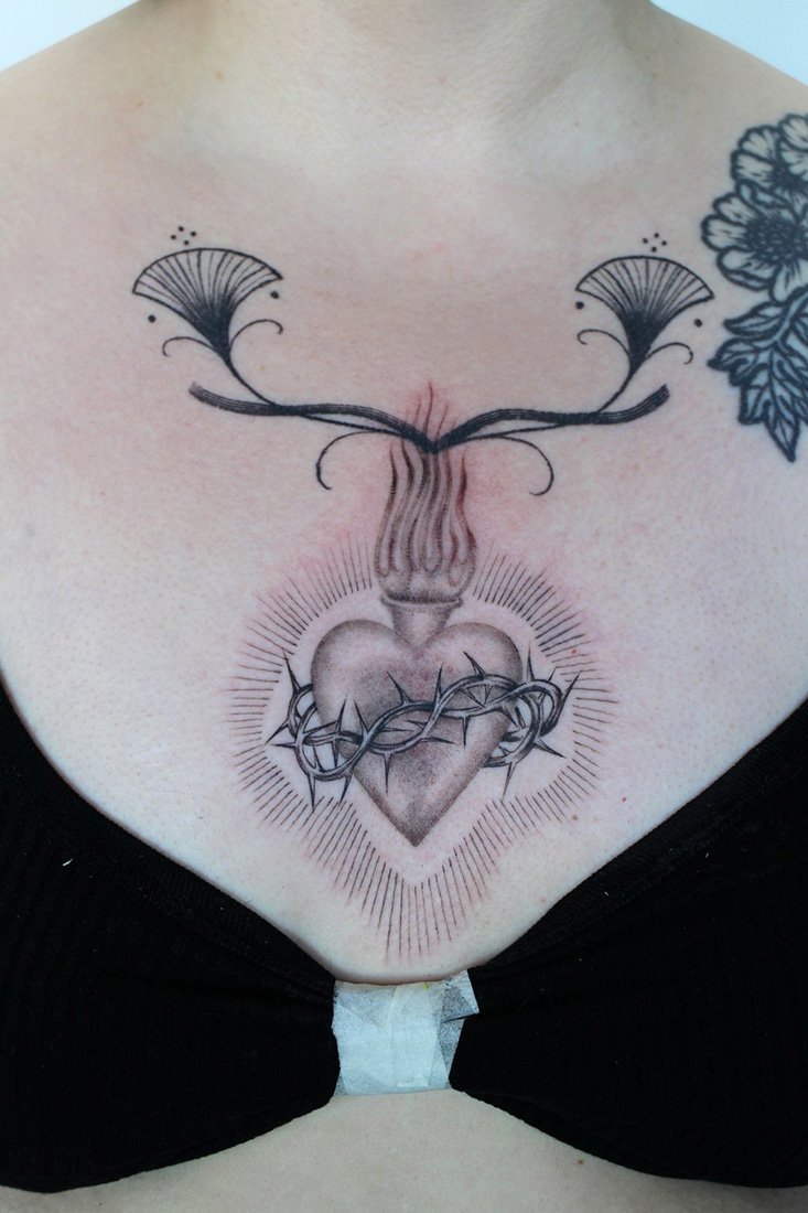 sacred heart chest piece female delicate fine line Jacqueline may tattoo art black and grey toronto artist.jpeg