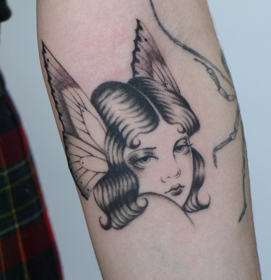 butterfly sad lady single needle sad Jacqueline may tattoo art.jpeg