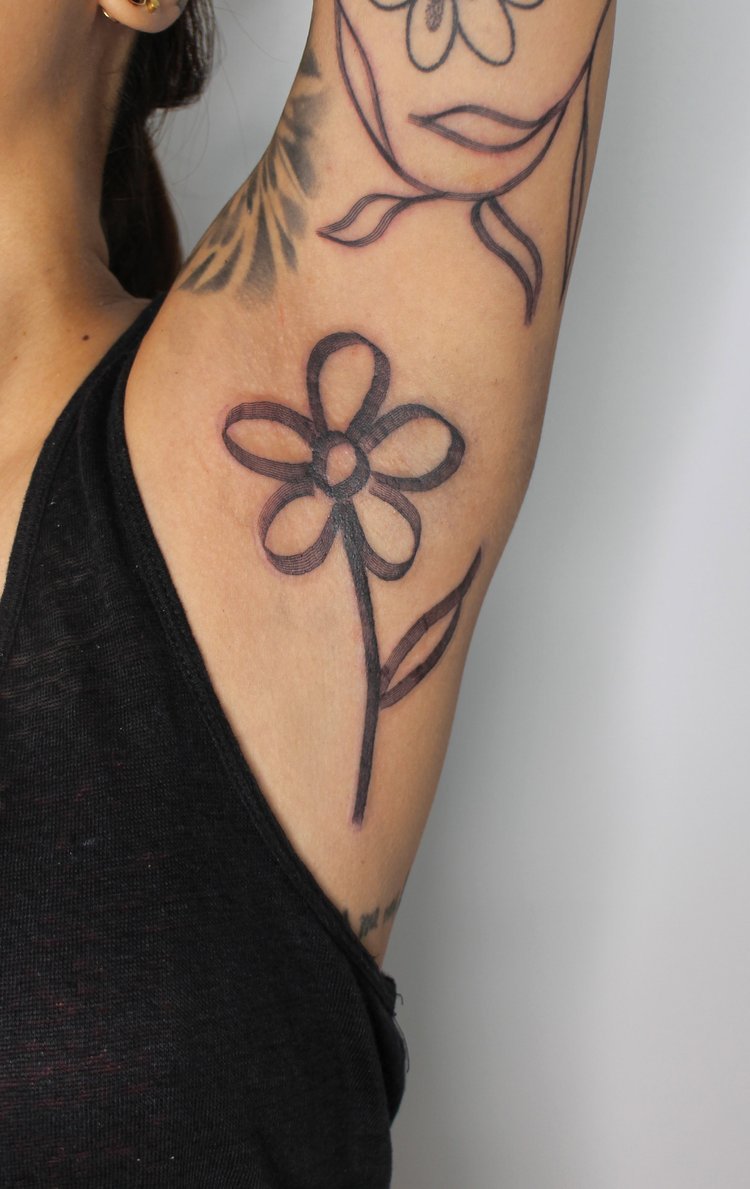 female bold underarm mag drag Jacqueline may tattoo art black and grey toronto artist.jpeg