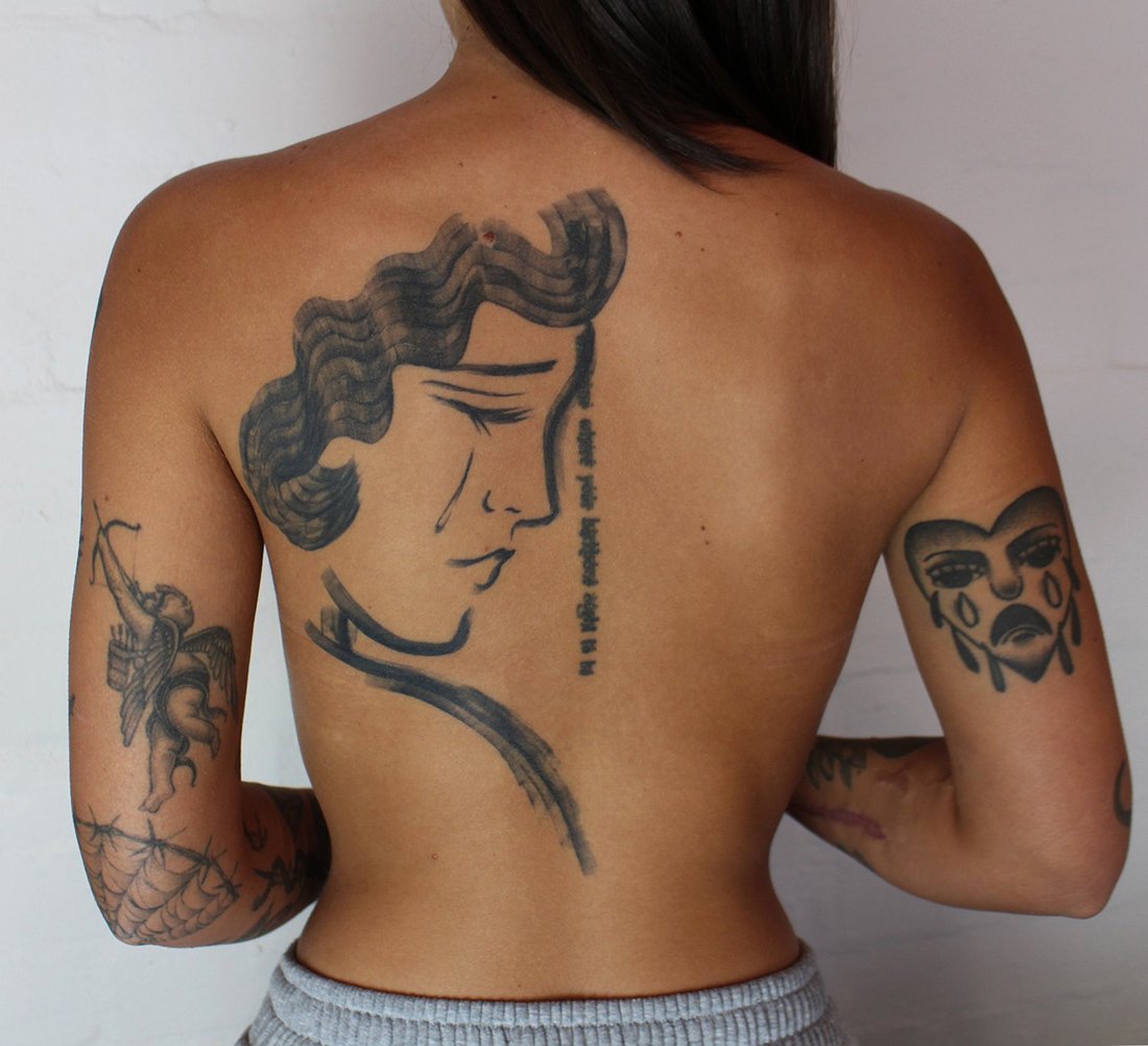 healed back piece female simple minimalist mag drag Jacqueline may tattoo art.jpeg