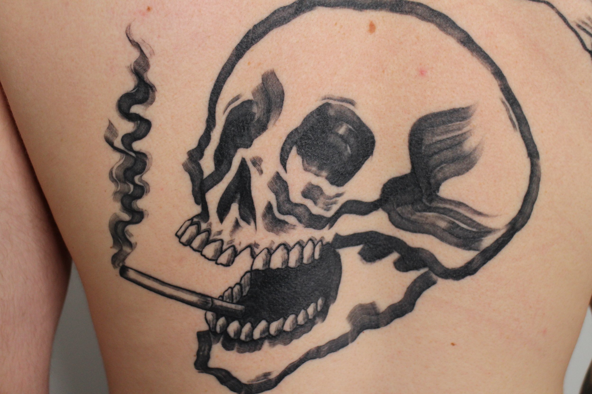 skull mag drag bold tattoo Jacqueline may tattoo art black and grey toronto artist.jpeg