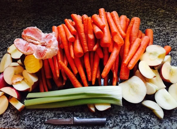 We've got a little carrot (haha), celery, apple, grapefruit, and just 1/2 of a golden beet and red beet. It should be tasty, bright and will nourish my blood, kidneys, liver, cleanse my skin and body. Yay juice!