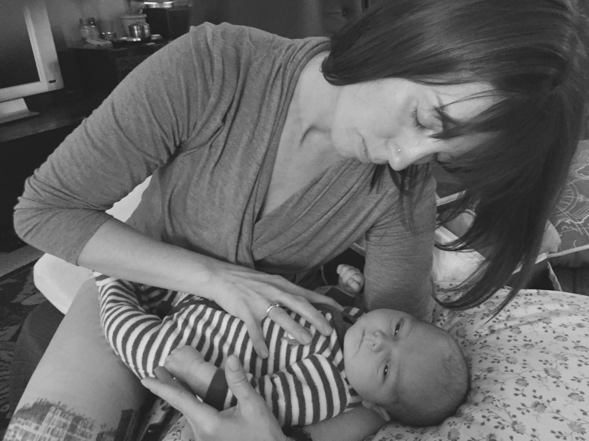 This is me doing some craniosacral therapy on a baby that was just 1 week old. What a joy! We all can benefit from the healing power of touch. I'd love to get you on my table!