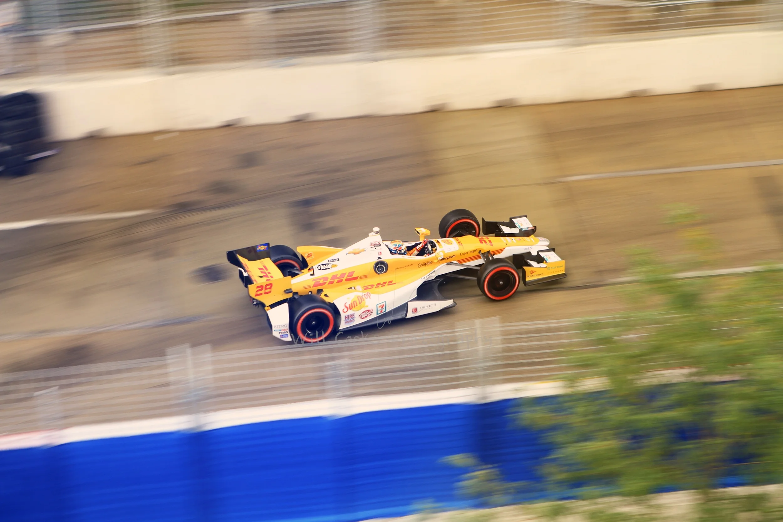 Ryan Hunter-Reay speeds down Pratt St after Turn 12 in Baltimore, MD