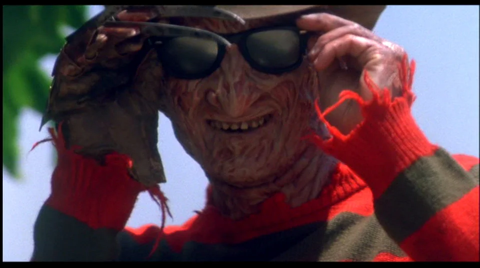 NO Freddy, you put the glasses on AFTER you make the bad puns!