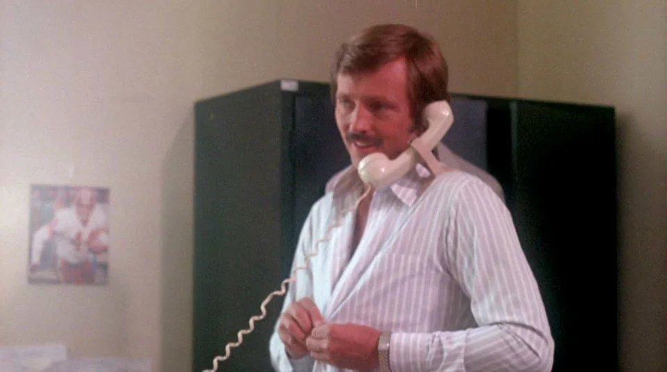 CAP: I am randomly losing my shit at a shoulder holder for a phone handset.