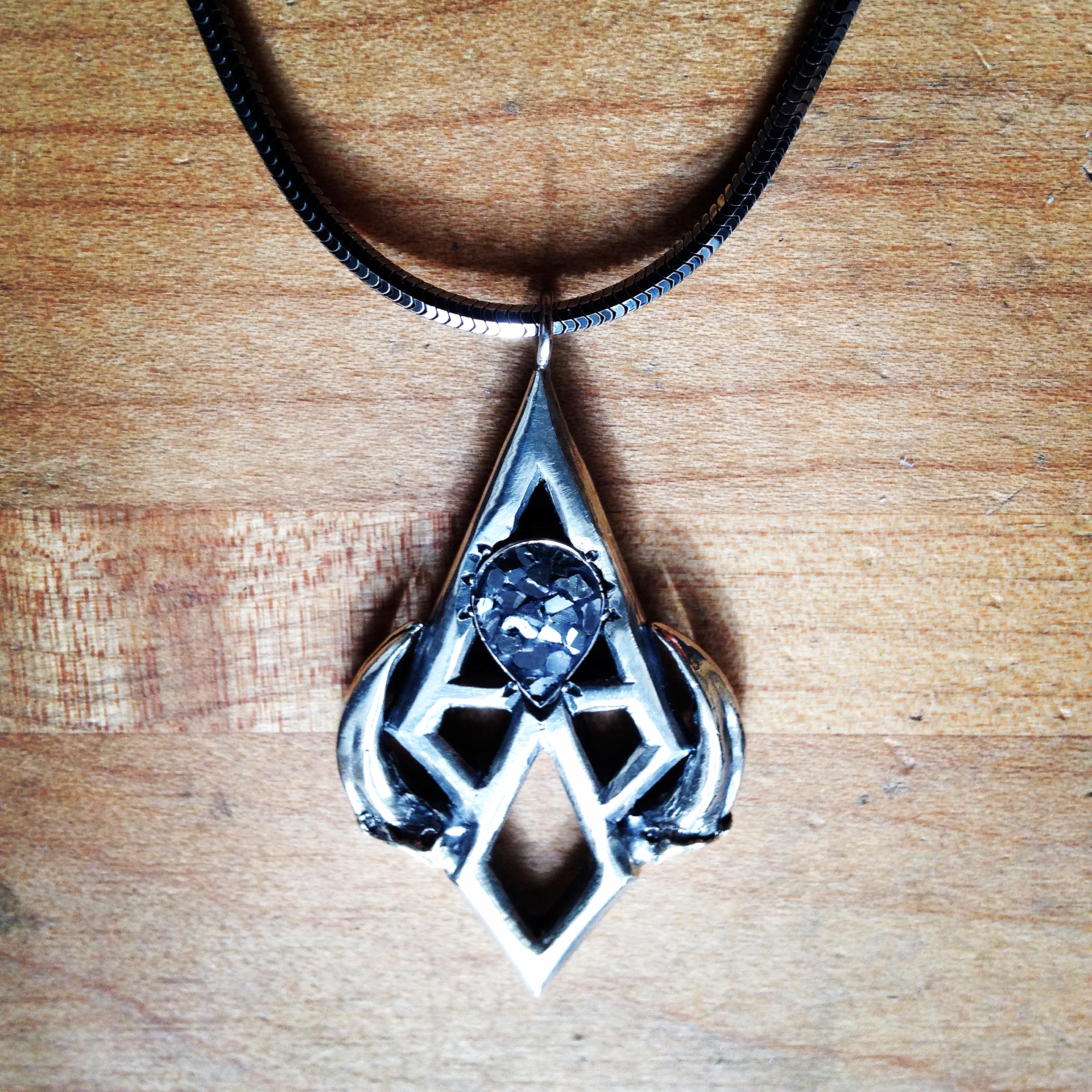 Crushed diamond and fox claw pendant