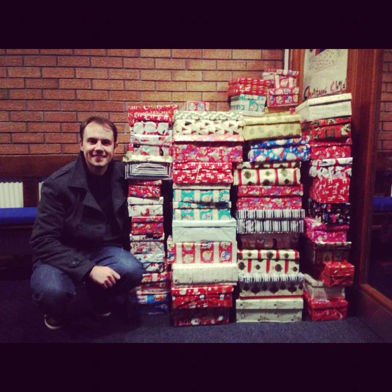 Mark shows off the finished collection of shoeboxes