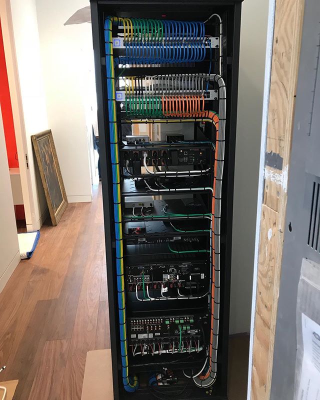 100s of hours have gone in to designing the system, dressing and terminating the panels in the wall, building and dressing the rack. We build the rack in our office, and deliver it to site pre wired. We then run our rack bundle of wires in to the wall panels and work on interconnecting the panel and the rack. As soon as the power is live, the systems start to function. This is a recipe we’ve repeated many times and they result in stable well performing systems.
#motorizedshades #centralizedlighting #distributedaudio #enterprisenetwork #surveillance #accesscontrol #homeautomation