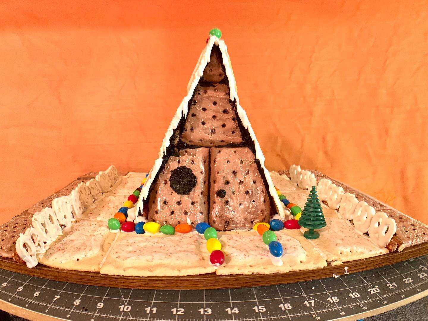 My entry in a PopTart Gingerbread-y Friend Challenge: Chateau Wheeler. Made with strawberry and fudge PopTarts, a lotta pretzels for framing, and other sweets that I can&rsquo;t eat due to a tooth ache.