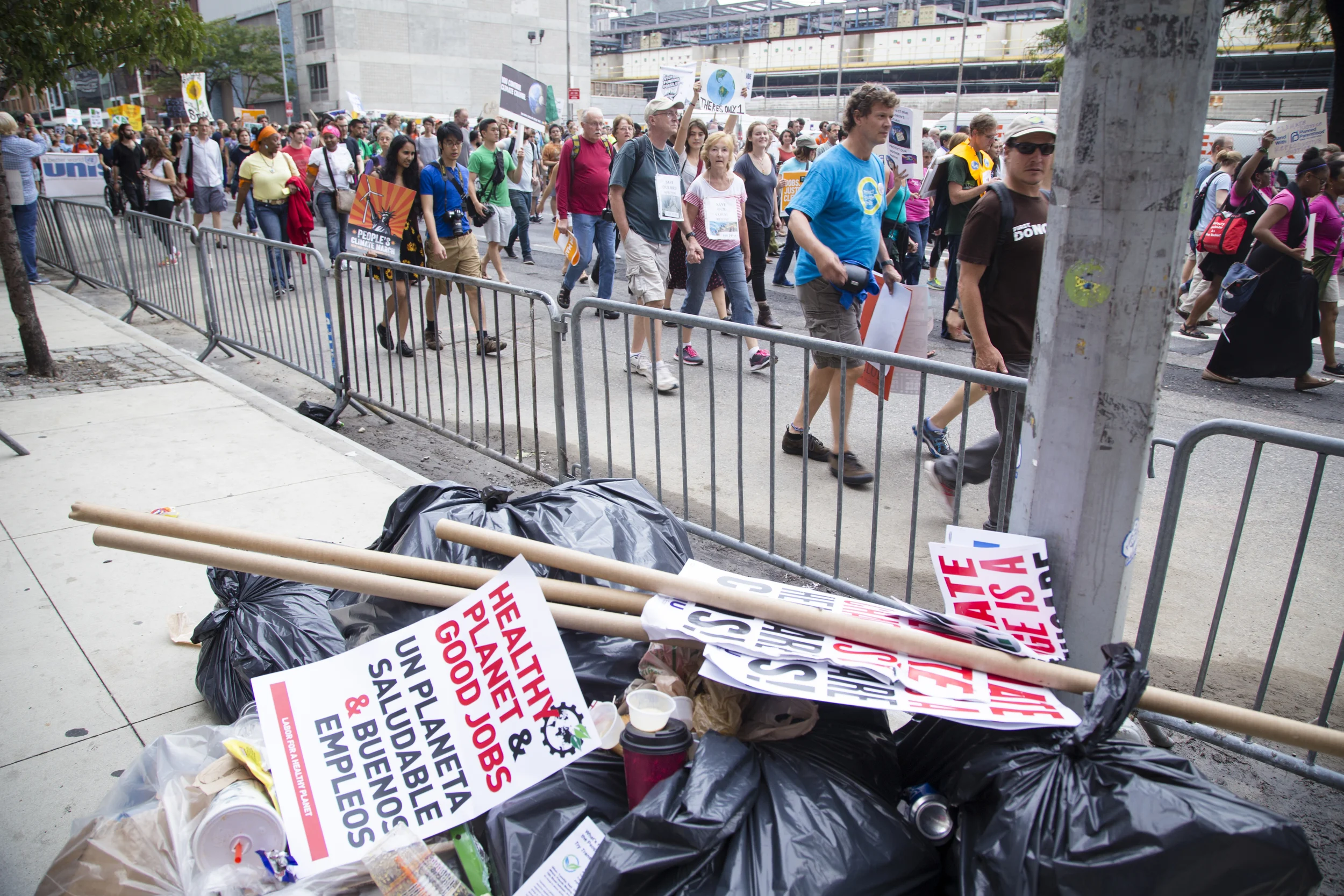 300,000 participants in the Climate Change march, attracted nation wide attention yet left behind litter in New York City on the 21st of September 2014. By Ann Wang