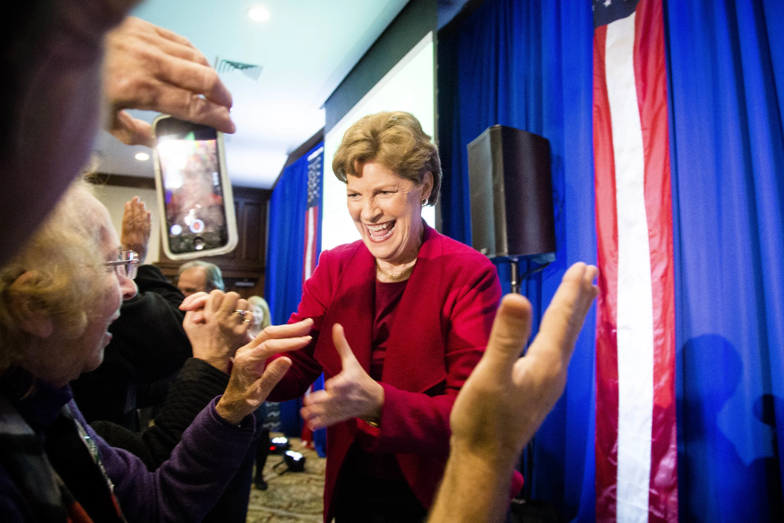 Manchester, NH, USA.Nov. 4, 2014. After Shaheen defeats Brown to keep Senate Seat. She was greeted by supporters while walking into the Puritan conference center in Manchester, New Hampshire. Photo by Ann Wang