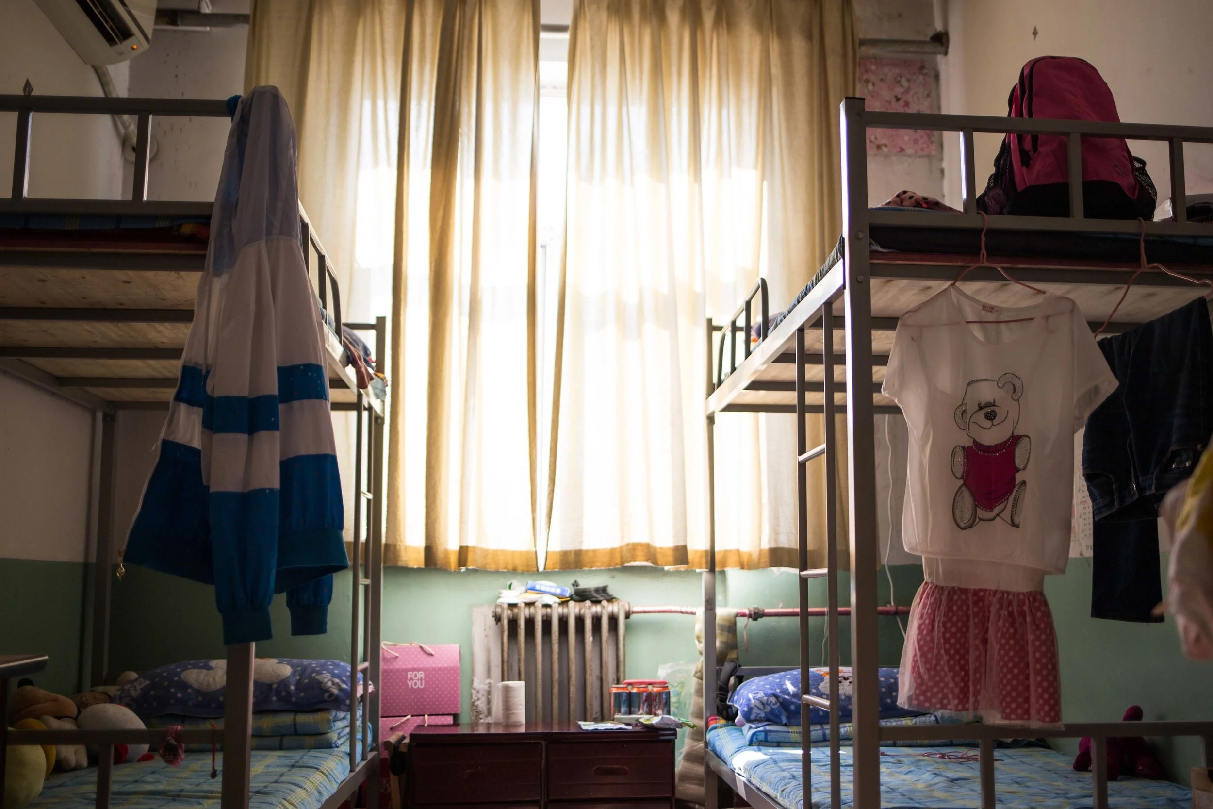 The dormitory at the Green Harbor. Most often the living condition at school is better than what the families can offer to the kids, which is ofter located in rural farming villages. Photo by Ann Wang