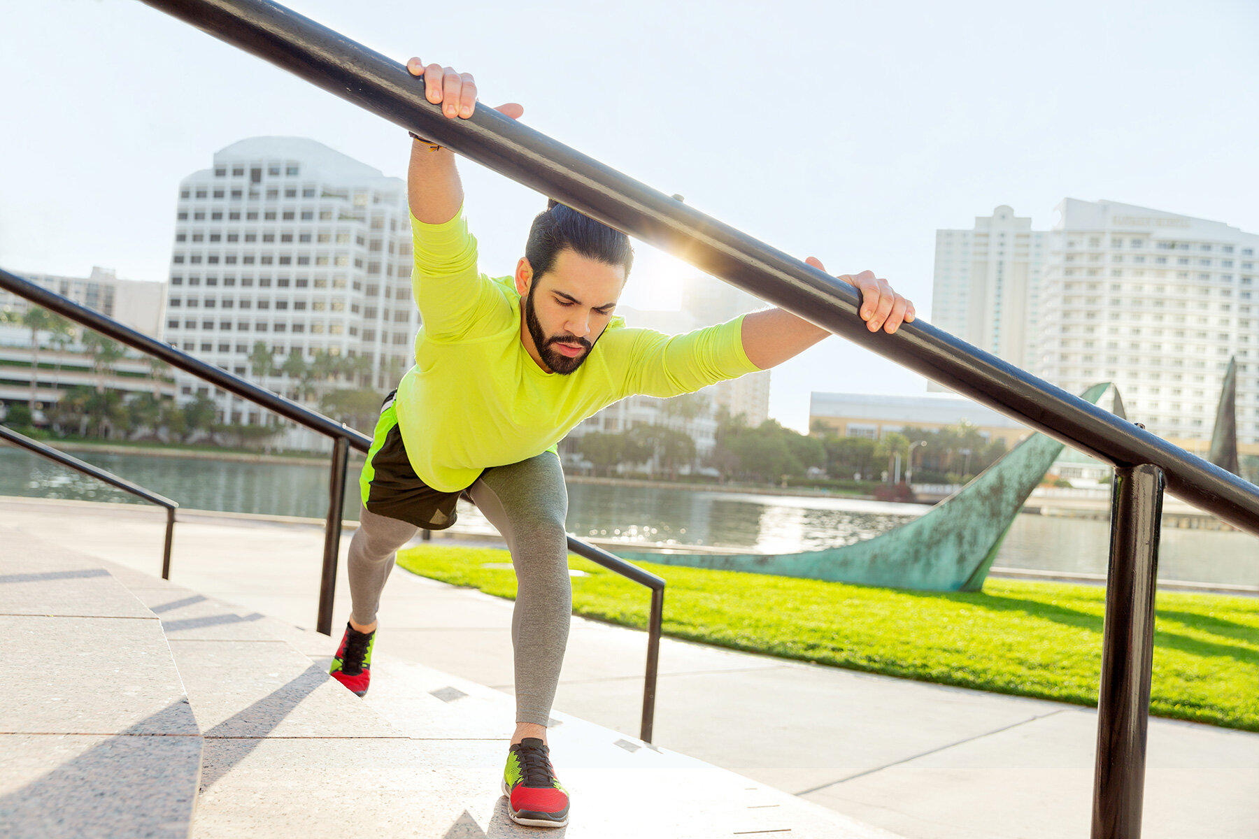 miami_lifestyle_beach_fitness_photography_david_gonzalez_girl_outdoor_workout_Young-man-stretching-out-at-the-streets.jpg