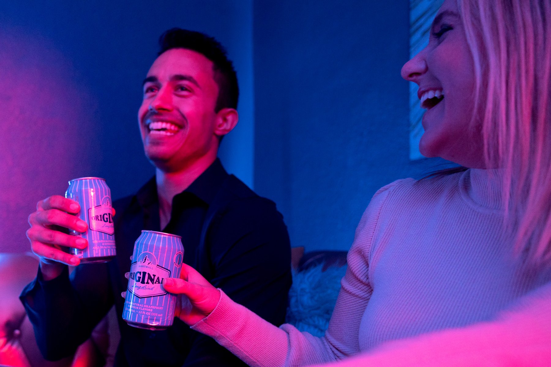 2 friends drinking and smiling.jpg