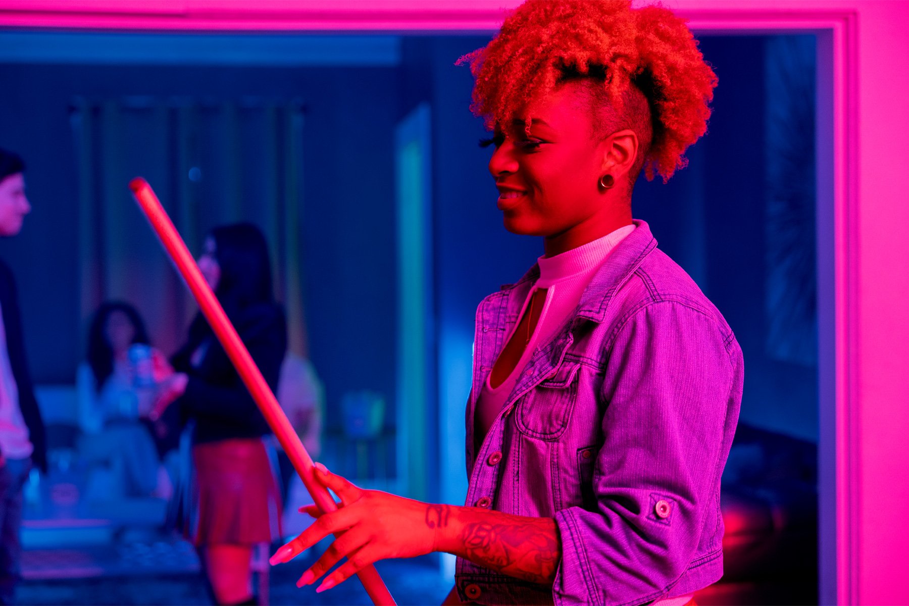 Afroamerican woman playing pool.jpg