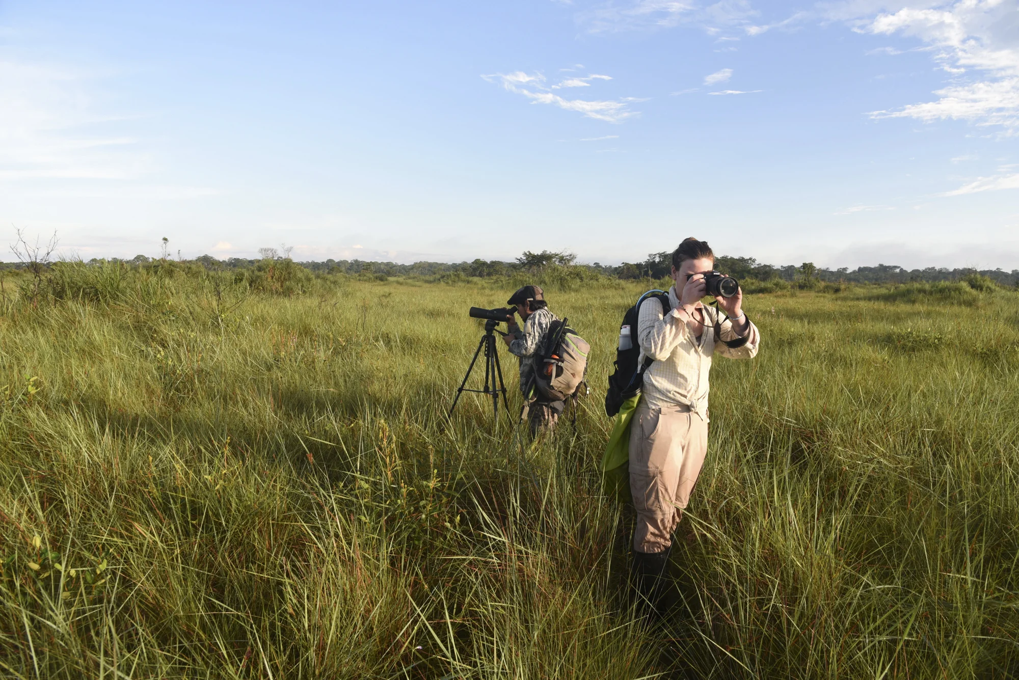  Yohamir and Maisie survey the grassland for bird species. 