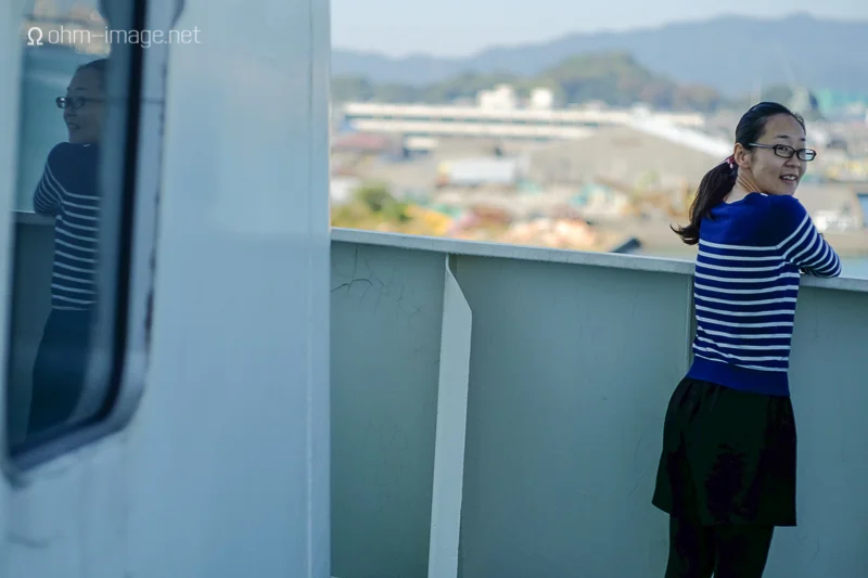 Megumi overlooking the docks in Fukuoka