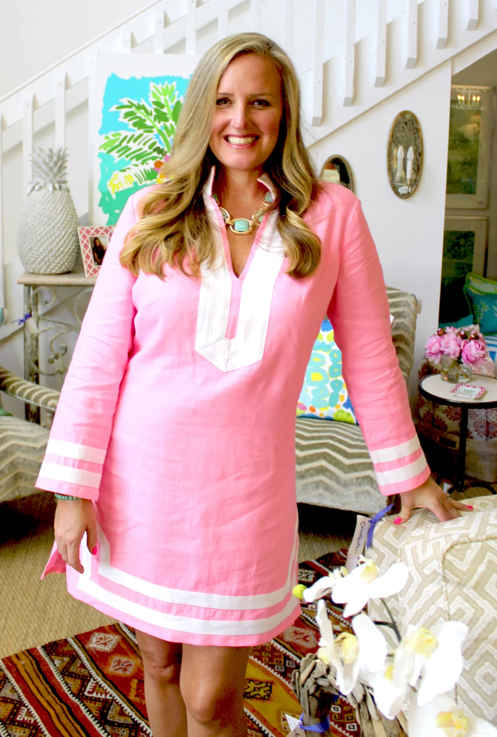 Kelly Tracht with her paintings