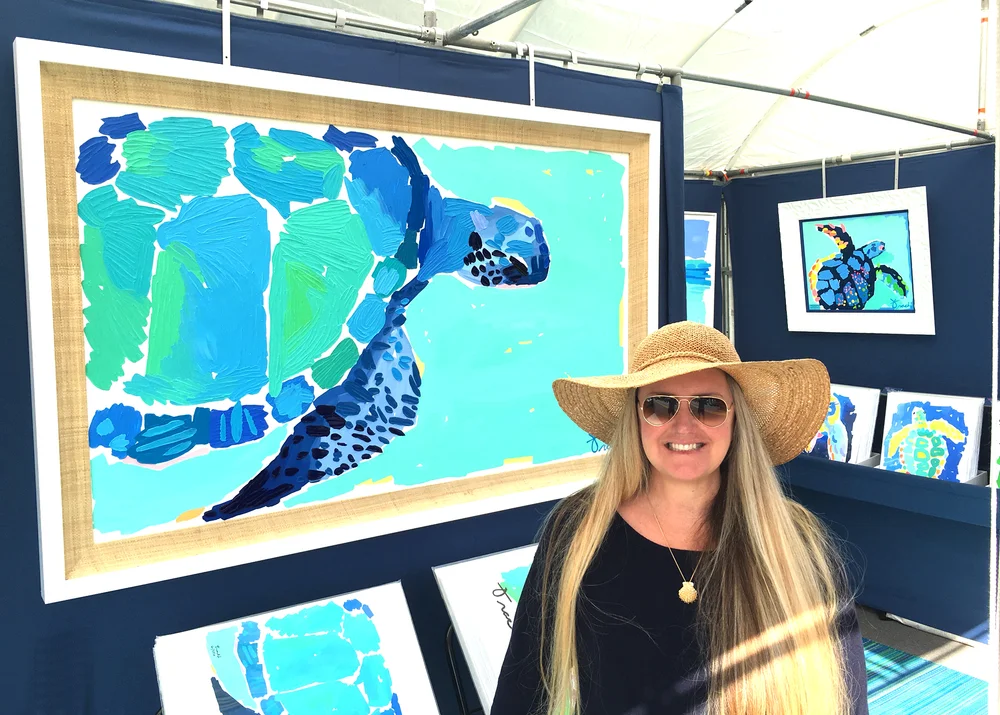 Kelly Tracht in her art show booth