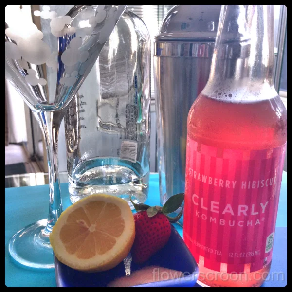 Strawberry Lemon Kiss Martini ingredients: Clearly Kombucha Strawberry Hibiscus, lemon, sugar, strawberry, vodka