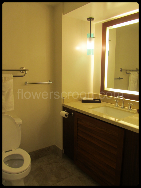 Toilet and sink inside bathroom