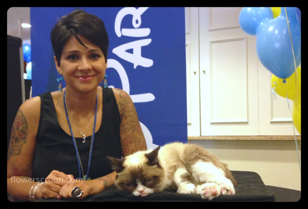 It's actually pretty tough to be grumpy around Grumpy Cat