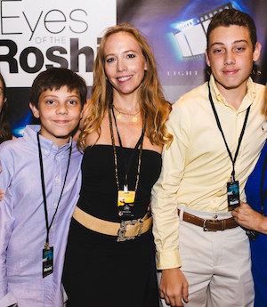 Stacy Whittle with her two sons at a premiere 