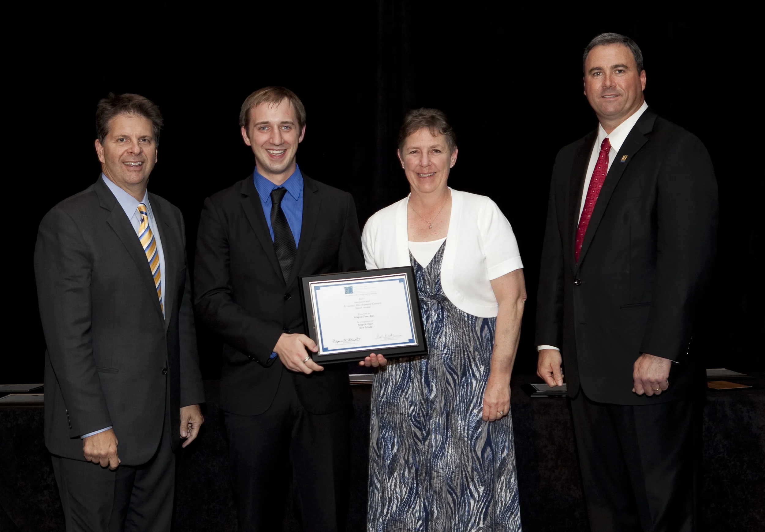 Map-N-Tour receives International Economic Development Council Silver Award from Paul L. Krutko, FM - Chair, IEDC and President & CEO, Ann Arbor SPARK and Bryan T. Daniels, CEcD - Chair, IEDC Awards Advisory Committee and President & CEO, Blount Partnership