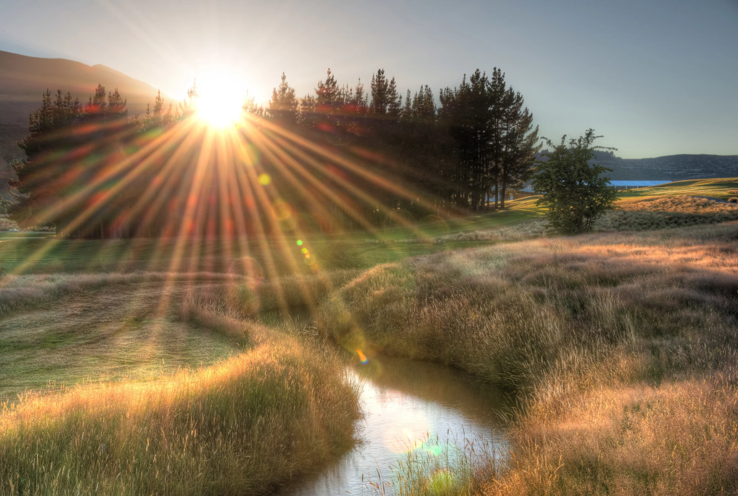 The Hills in New Zealand at sunrise. 