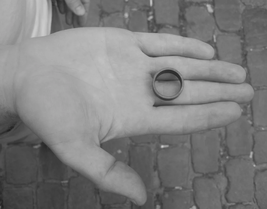  Karl-Ejnar is a goldsmith and has an intern that he would like to teach a lot of skills. Therefore, he gave her the assignment to make a silver ring, which should keep the dimensions of 1/10-part millimeters.  Name: Karl-Ejner.  What: Silver ring.  