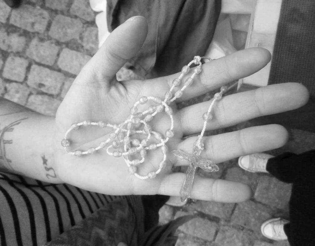  Anna got the pink plastic Rosary necklace from her mentor after finishing her final exam at The Institute of precious metal in Copenhagen. It is a special gift, selected for her to wish congratulations on a successful exam. Anna has been surrounded 