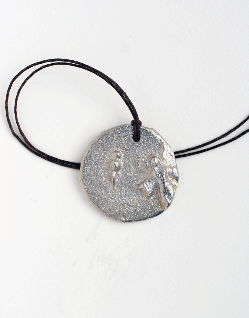   Sergei’s imprint cast in Sn 99.9.  