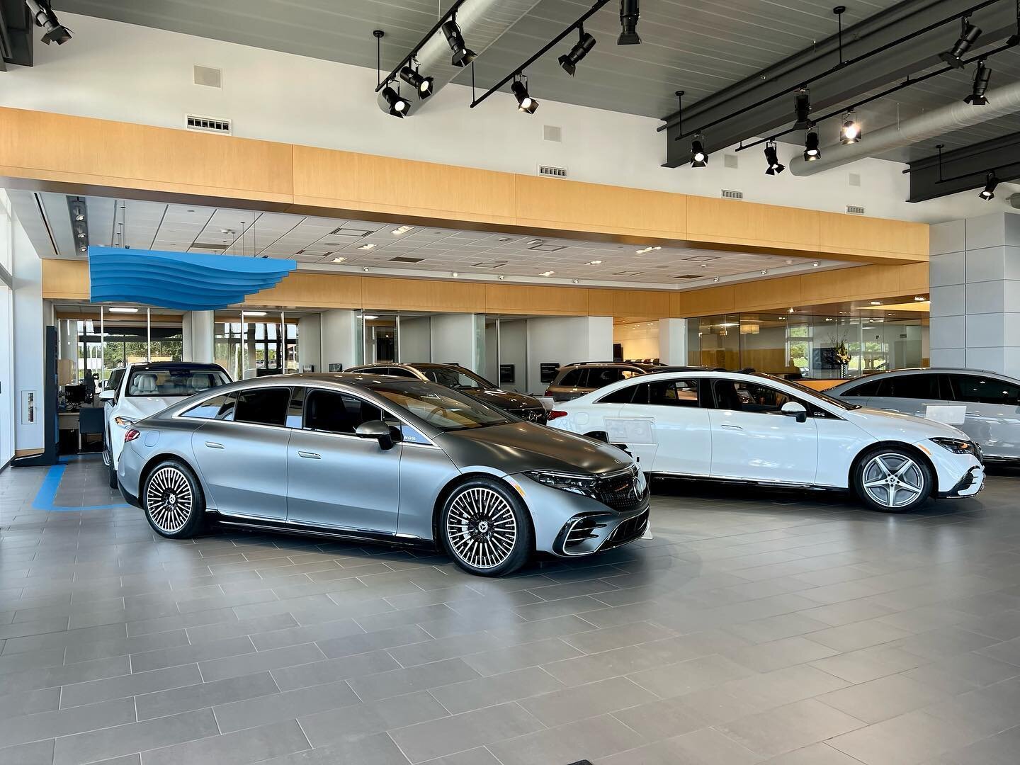 A peek inside the incredible @parkplacemotorcarsarlington showroom!  This is the @mercedesbenz all-electric EQ lineup. What absolutely incredible vehicles! ❤️ @parkplacetexas #texas #dallas #earthday #mercedes #eqs
