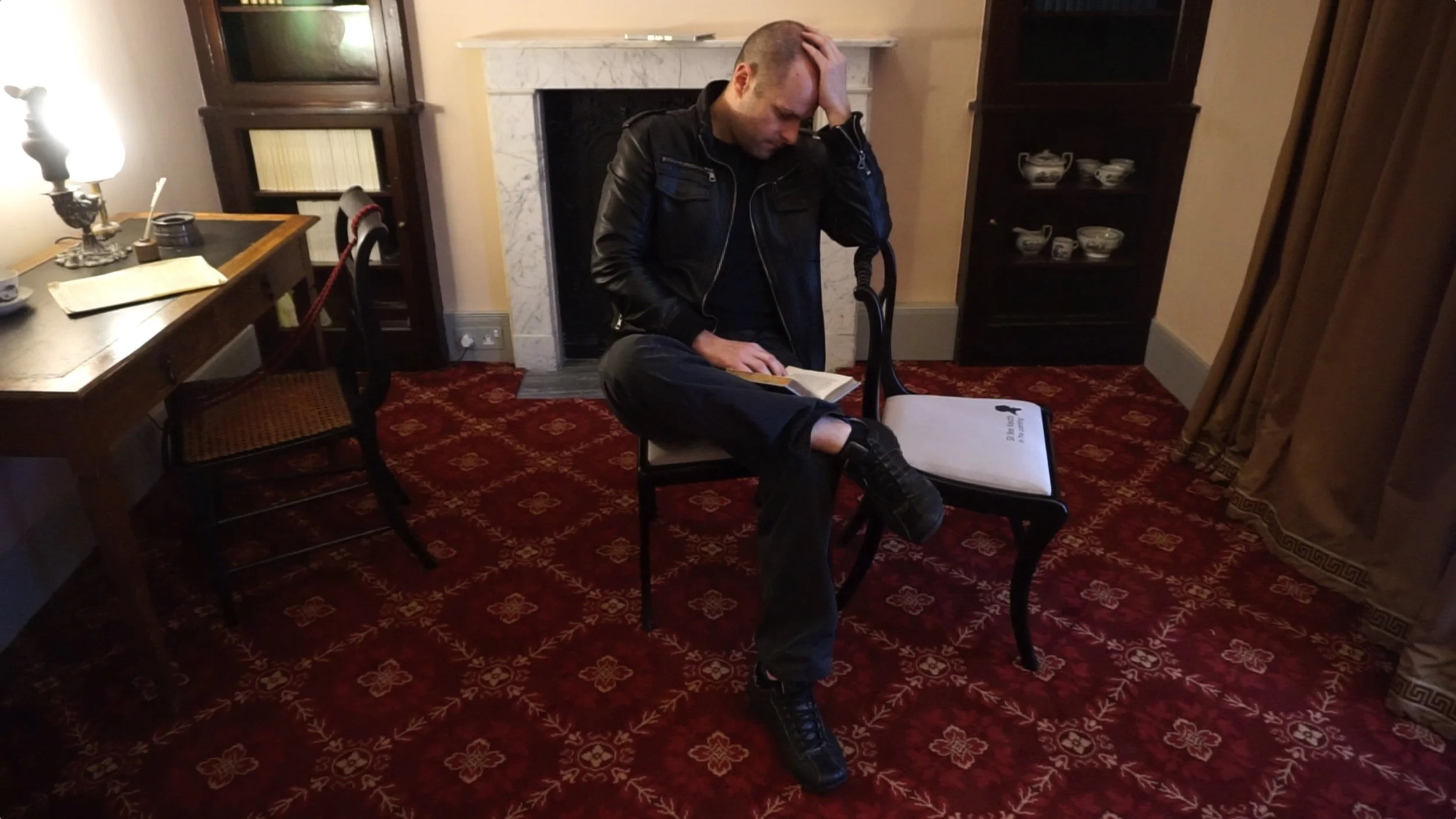 JESSE WAUGH IN THE POSE OF JOHN KEATS AT JOHN KEATS HOUSE, HAMPSTEAD, LONDON